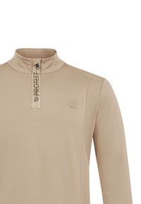 Haut beige à manches longues avec fermeture éclair au quart, col montant, marquage vertical "PROTEST" sur la patte de la fermeture éclair et petit logo sur la poitrine gauche.