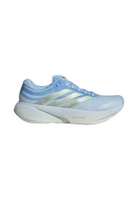 Light blue athletic shoe with silver and green accent stripes, breathable upper, textured surface, and cushioned white sole.