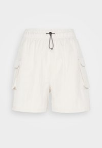 White cargo shorts with an elastic waistband and black drawstring. Features two side pockets and a textured fabric.