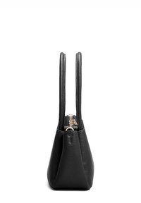 Black leather handbag with a textured finish, two short handles, a zip closure, and a tapered shape. No visible patterns or additional details.