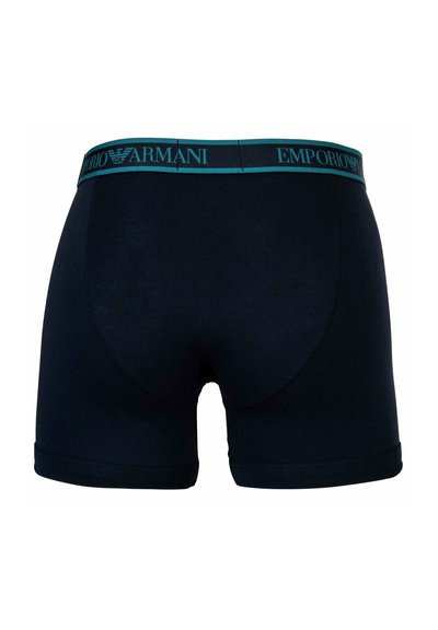 Temno modri bombažni bokserji z turkiznim pasom z logotipom Emporio Armani in prilegajočim se dizajnom z gladko teksturo.