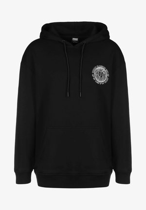 Must värviline kapuutsiga pusakas, mis on valmistatud puuvilla segust, esiküljel on kenguru tasku, nööridega kapuuts ja rinnal ümmargune graafiline logo.