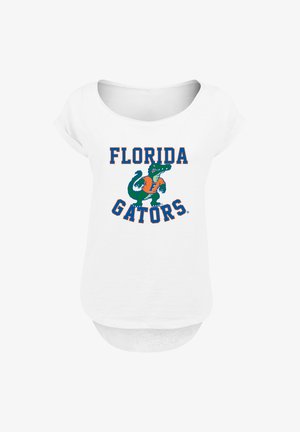 White T-shirt with a round neckline and rolled sleeves. Features "FLORIDA GATORS" text and a green alligator graphic in the center.