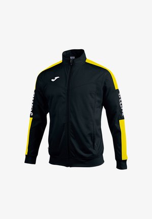 Schwarze Sportjacke mit Reißverschluss, gelben Streifen auf Schultern und Armen, weißem Logo auf der Brust und Text auf den Ärmeln.