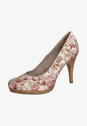 Chaussure à talon haut florale en tissu couleur crème avec des motifs de roses roses et vertes, bout rond et talon à texture en liège.