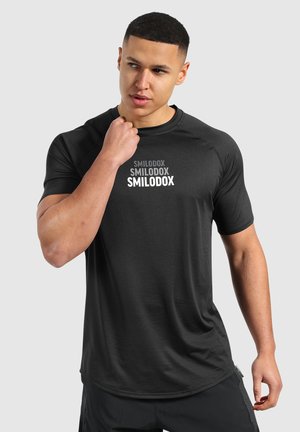 POWERFIT TRIPLE PERFORMANCE - Sport T-Shirt - schwarz