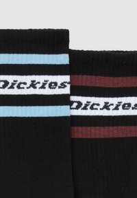 Calzini neri per equipaggio con strisce orizzontali in azzurro chiaro e marrone scuro, con il logo "Dickies" in bianco che attraversa le strisce.
