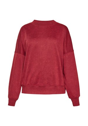 Punainen collegepaita, joka on valmistettu pehmeästä materiaalista. Siinä on pyöreä kaulus, pudotetut olkapäät ja ribatut hihansuut, ja se on rentoa mallia.