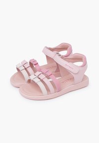 Sandalias rosas con múltiples correas y hebillas, textura suave y suela acolchada. Diseñadas para brindar comodidad y soporte.