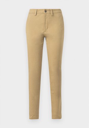 Khaki chinos wykonane z materiału bawełnianego, charakteryzujące się slim fit, szlufkami na pasek, kieszeniami z przodu oraz pojedynczym zapięciem na guzik.