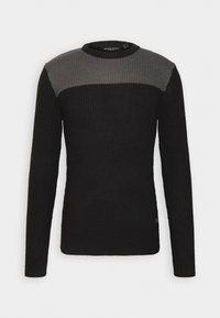 Pull noir avec une finition texturée. Présente une accent gris horizontal sur la poitrine. Encolure ras du cou, manches longues et poignets ajustés.