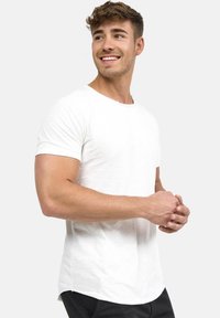 White short-sleeve t-shirt with a crew neckline, made from lightweight fabric. Features a straight hem and a relaxed fit.