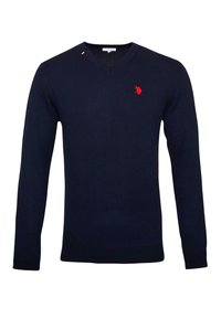 Marineblauwe V-hals trui gemaakt van gebreide stof, met een klein rood logo op de borst en geribde manchetten en zoom. Strakke pasvorm met minimalistische accenten.