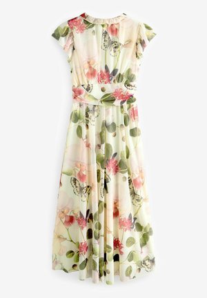 Robe florale avec des manches courtes à volants, présentant un fond clair, des feuilles vertes et des imprimés colorés de papillons et de fleurs.