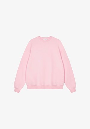 Rosa sweatshirt gjord av mjuk bomullsblandning, med rund hals, sänkta axlar och ribbade muddar och nederkant.