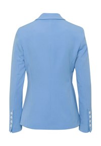 Vaaleansininen muotolaukku, jossa on leikattu kaulus, pitkät hihat ja napit hihansuissa. Sujuva kangaspinta, istuva malli.