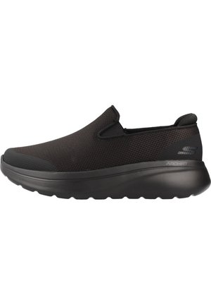 Chaussure de sport noire à enfiler avec tige en mesh et semelle épaisse coussinée portant l'inscription "ARCH FIT" ainsi qu'un petit logo au talon.