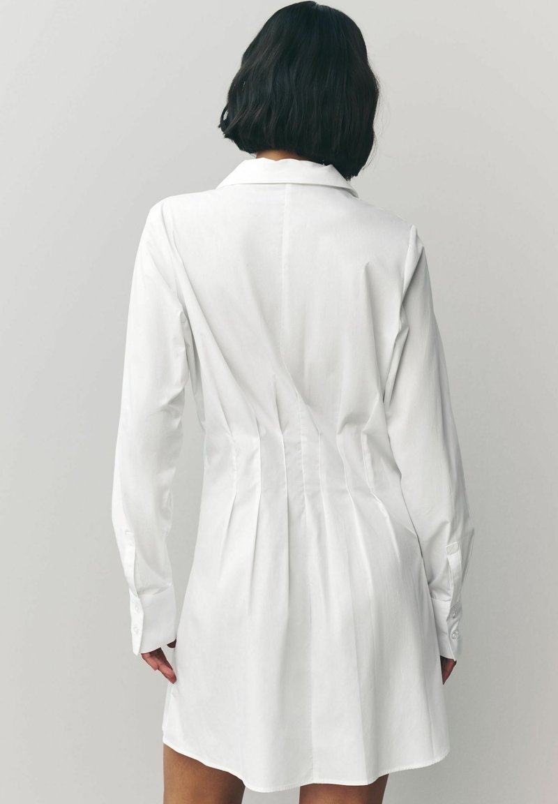 slim fit dress slacks Women's City Chic Ivory Long Sleeve Bodysuit | Size: L main image 1