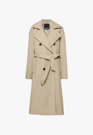 Trench-coat beige croisé à ceinture à la taille, larges revers, pattes d'épaule boutonnées et poches avant.