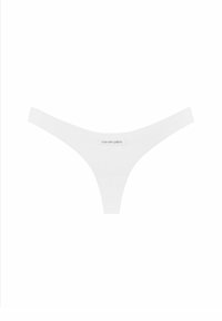 White thong made of smooth fabric with minimal coverage. Features sleek lines and a label reading "GOD SAVE QUEENS" in black.