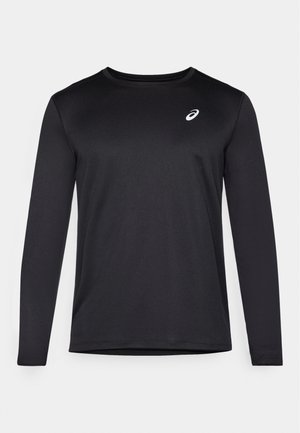 Maillot de sport noir à manches longues en tissu texturé, doté d'un col rond et d'un petit logo sur la poitrine.