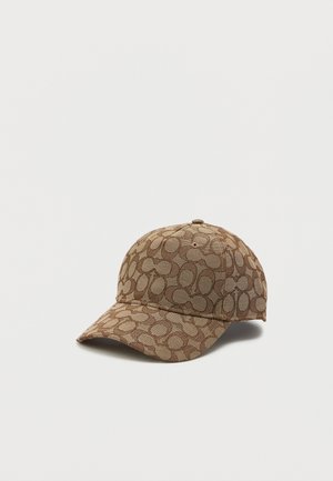 Barna sapka, textúrált anyaggal, ovális formákból álló integrált mintázattal, ívelt karimával és hátul állítható pánttal.