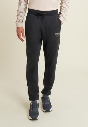 WITH CUFFED BOTTOMS AND DETAILS - Pantaloni sportivi - black