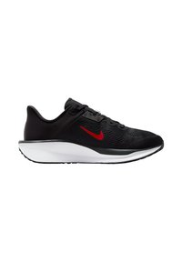 Zapatilla deportiva negra con parte superior de malla, swoosh rojo de Nike, cuello acolchado y mediana blanca, diseñada para la comodidad y el rendimiento.