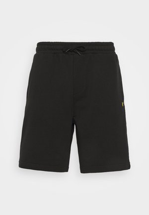 Shorts noirs en coton avec une taille élastique et un cordon de serrage réglable, dotés de poches latérales et d'un petit logo jaune sur le côté.