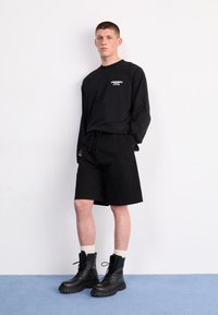 Carhartt WIP FLOYD SHORT - Shorts di jeans - black