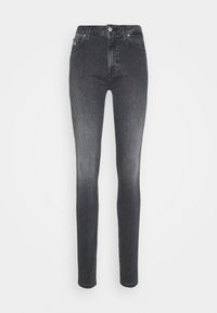 Jeans skinny de talle alto hechos de denim gris oscuro. Presenta un cierre de botón, cinco bolsillos y un lavado desgastado con una textura suave.