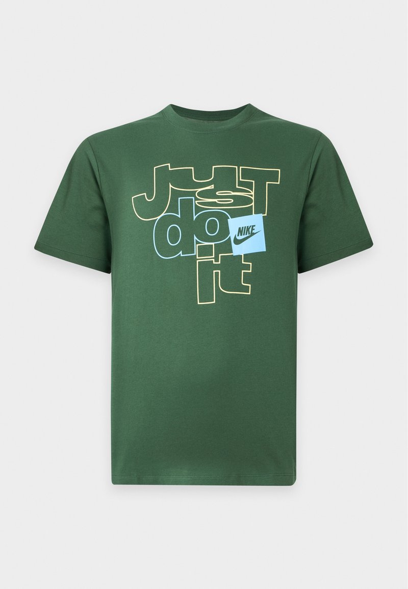 Grøn kortærmet t-shirt med teksten "Just do it" i gul og blå samt en lille blå firkant med Nike-logo på fronten.