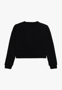 Czarny długi rękaw, krótki crop top z ribbowanymi mankietami i dołem, pokazany z tyłu na białym tle.