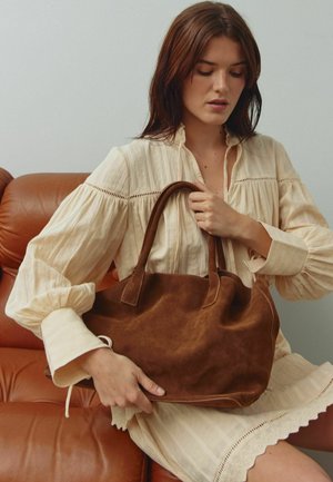 Noella Kandekott - chocolate brown