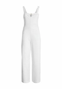Jupe en lin blanc avec des jambes larges, de fines bretelles, une fermeture à boutons à l'avant et un accent tressé à la taille. Deux poches latérales incluses.