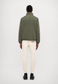 EA7 Emporio Armani GIUBBOTTO UNISEX - Lahka jakna - beetle