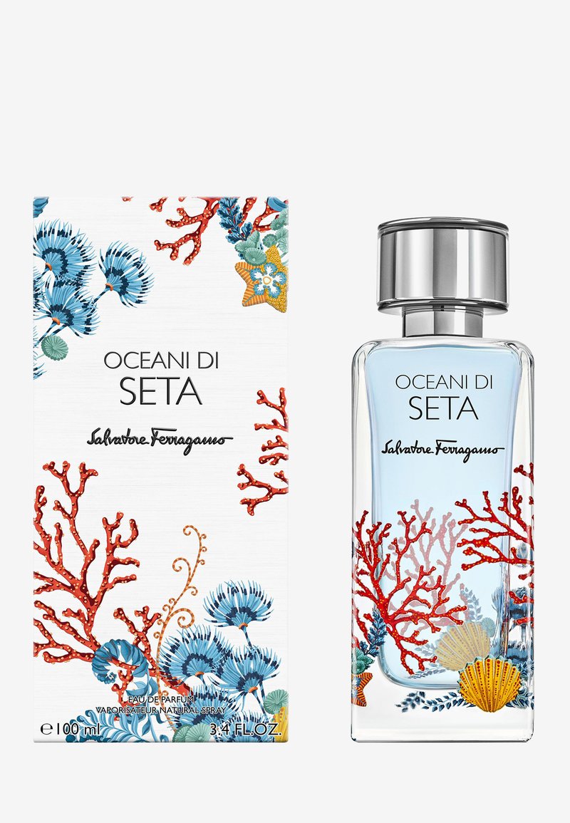 Perfume bottle and matching box with ocean-themed coral, shell, and floral designs, labeled "Oceani di Seta" by Salvatore Ferragamo.