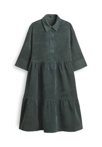 Donkergroene ribfluwelen jurk met kraag, knoopsluiting halverwege, geraffineerde tiers en driekwart mouwen.