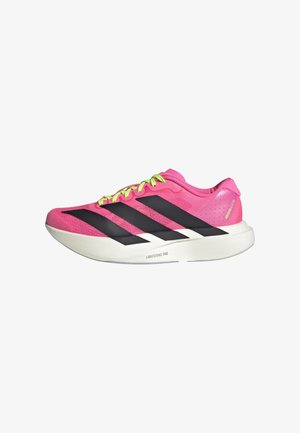 Pink running shoe with black stripes, featuring a textured upper, bright green laces, and a white outsole labeled "LIGHTSTRIKE PRO."