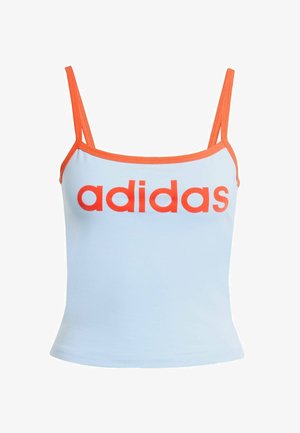 Svetlo modra majica na naramnice z oranžnim robom, ki ima izrazit rdeč logotip "adidas" čez prsa. Narejena je iz mehkega, elastičnega materiala. Tanke naramnice.