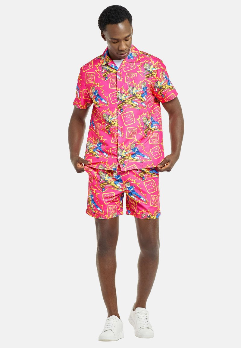 Pink short-sleeve shirt and shorts set, featuring vibrant tropical print with blue and yellow accents. Made of lightweight fabric, relaxed fit.