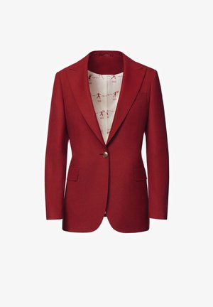 Czerwony żakiet z fakturowanej tkaniny, z wyciętym kołnierzem, zapięciem na pojedynczy guzik oraz dwiema przednimi kieszeniami. Podszewka w wzorzystym wnętrzu.