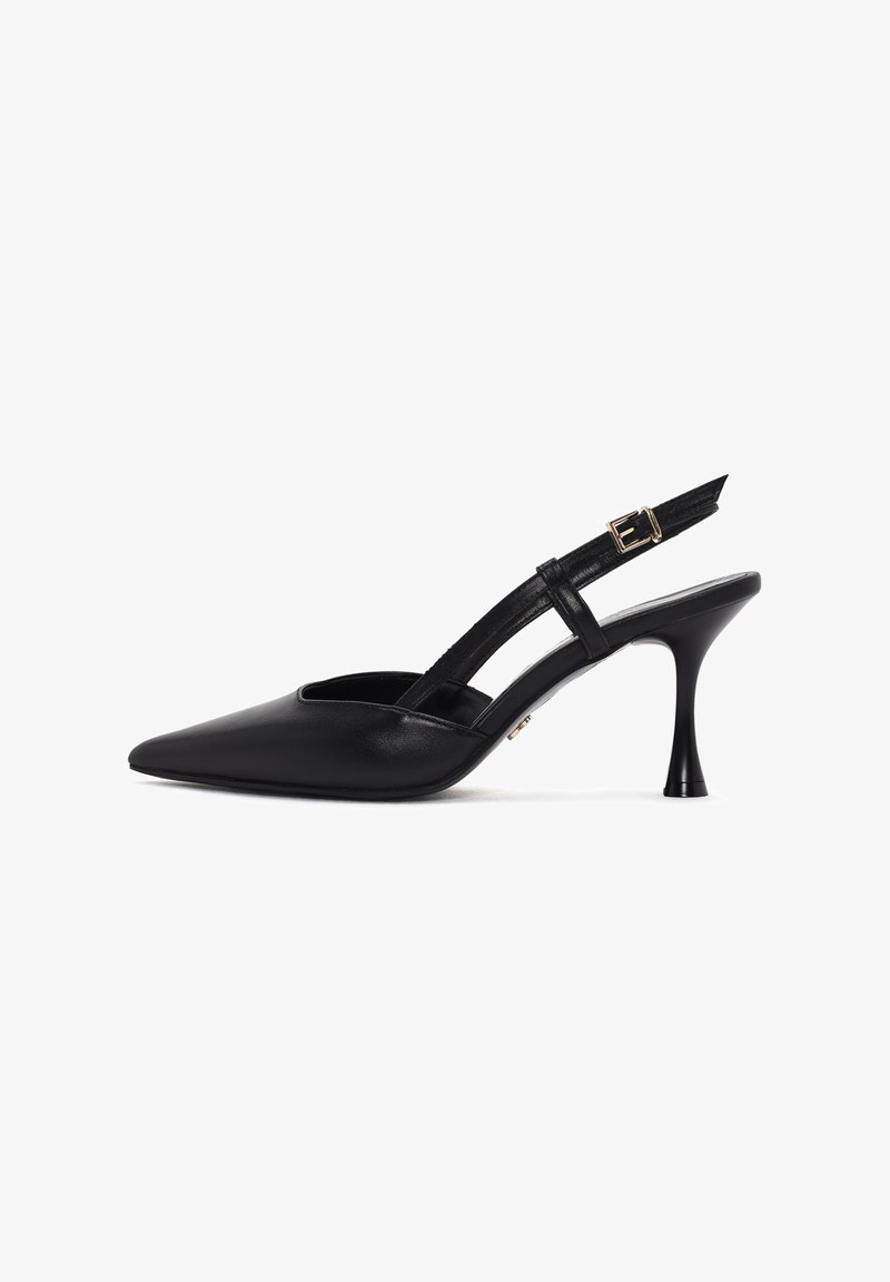 Black slingback heel with pointed toe, leather material, thin ankle strap featuring a gold buckle, and a uniquely shaped stiletto heel.