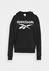 Czarna bawełniana bluza z kapturem, z przednią kieszenią typu kangur, kapturem ze sznurkiem oraz białym logo "Reebok" na piersi, z zaokrąglonym wzorem.