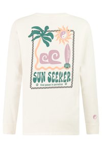 Langärmeliges cremefarbenes Hemd mit Grafik eines Palmbaums, Wellen, einer Sonne mit Yin-Yang, einem Surfbrett mit der Aufschrift "Protest" und dem Text "SUN SEEKER find peace in paradise."