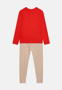 Liewood WILHELM PRINTED UNISEX SET - Pyjama - sandy/apple red