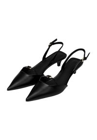 Escarpins noirs à brides arrière avec un bout pointu, finition mate lisse, talon élancé et quincaillerie dorée décorative sur la bride.