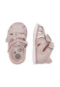 Vaaleanpunaiset lasten sandaalit, joissa on teksturoitu kangaspäällinen, säädettävät hihnat, avonainen varvasosa ja joustava kumipohja.