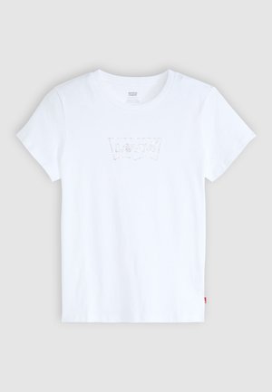 T-shirt en coton blanc avec un logo Levi's subtil et brillant au centre. Manches courtes et design classique à col rond.