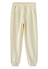 Jasnofioletowe spodnie dresowe z elastycznym pasem, sznurkiem do regulacji oraz bocznymi kieszeniami. Rękawy również są elastyczne, co zapewnia dopasowany krój.